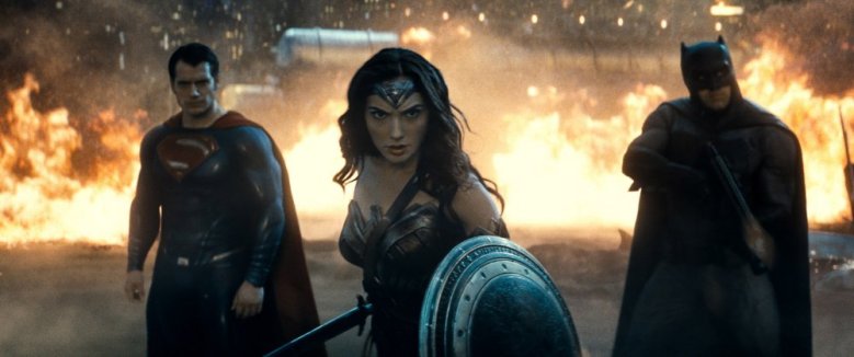batman-v-superman-dawn-of-justice-2016-002-duo-either-side-of-wonder-woman-against-flames.jpg
